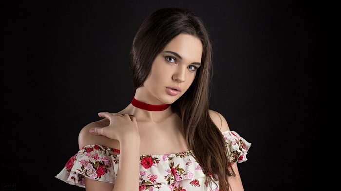 Lilya Lysenko portrait with red choker and floral dress