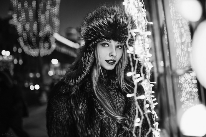 Alice Tarasenko in fur coat with Christmas lights