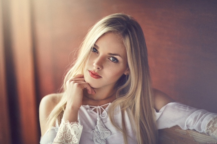 Woman with blonde hair and blue eyes, portrait
