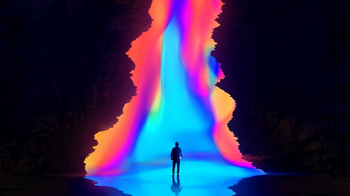 Man standing in a cave with a colorful light portal