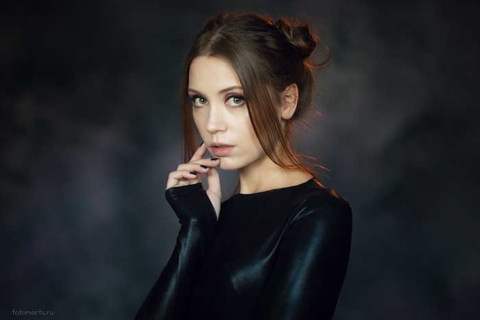 Portrait of Ksenia Kokoreva with painted nails