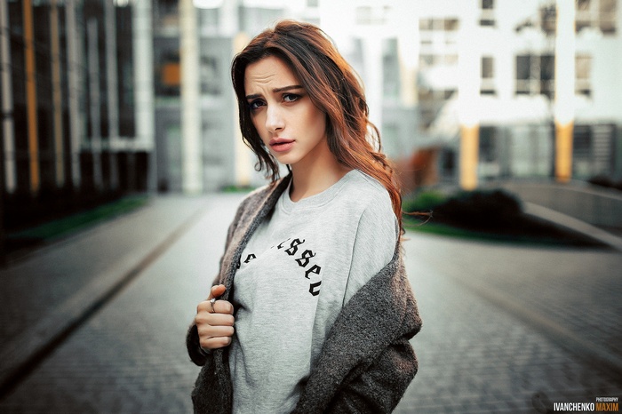 Woman in sweater outdoors