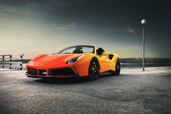 Orange and yellow Ferrari 488 Spider convertible
