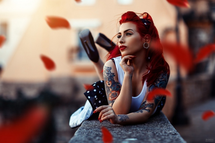 Woman with red hair and tattoos by Alessandro Di Cicco