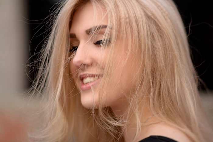 Portrait of Olia Gedz with blonde hair