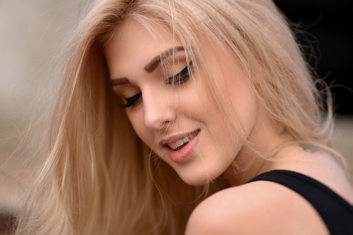 Portrait of Olia Gedz with blonde hair