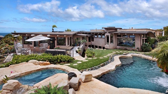 Modern house with swimming pool and ocean view
