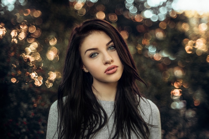 Portrait of a young woman with dark hair