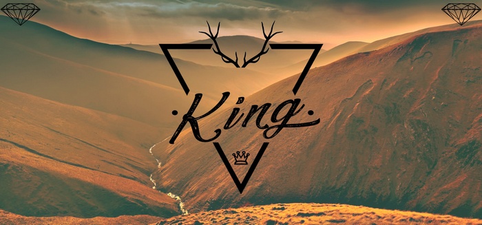 King logo with deer antlers and crown over mountains