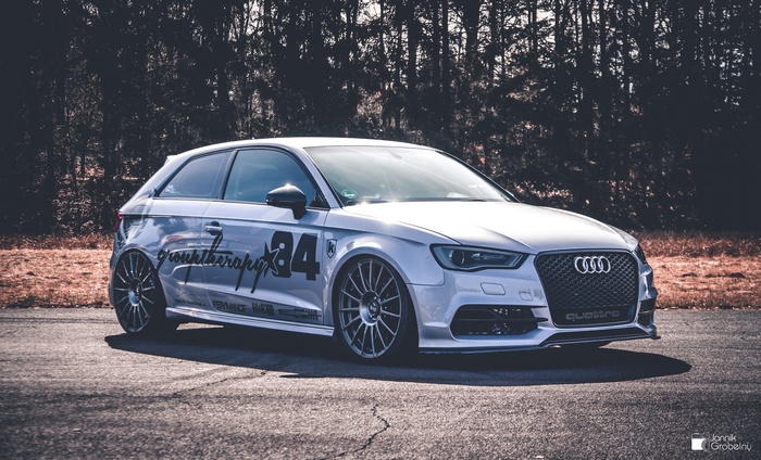 Silver Audi RS3 Quattro with racing decals