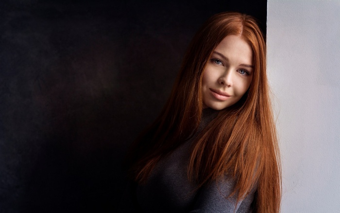 Portrait of a young redhead woman