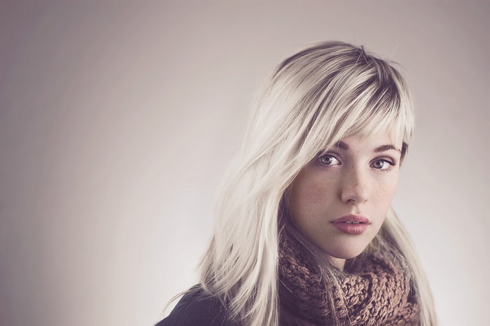 Devon Jade with platinum blonde hair and freckles