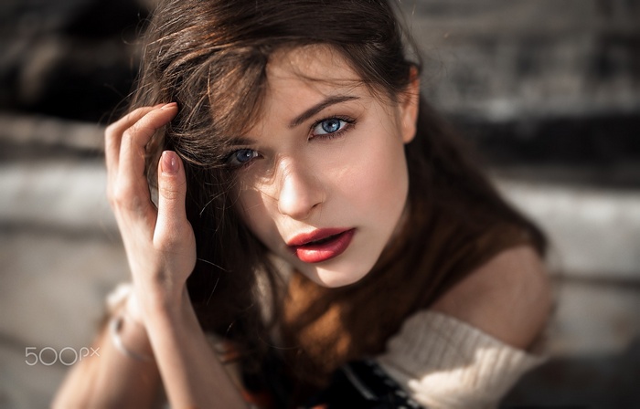 Woman with blue eyes and red lipstick, portrait