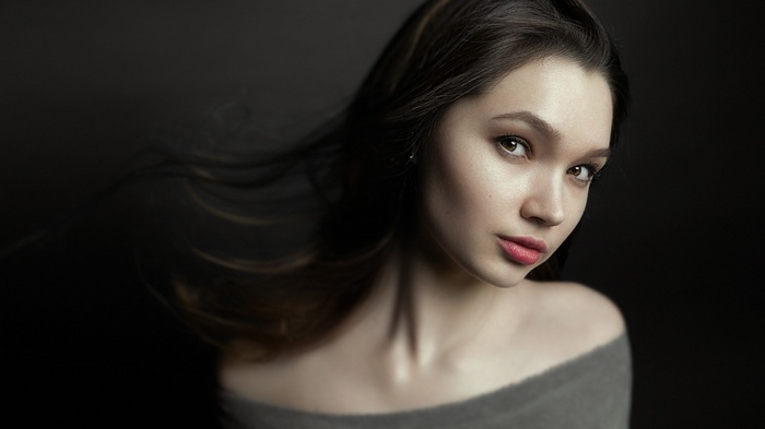 Portrait of a young woman with dark hair