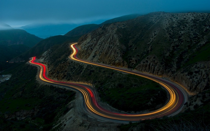 Long exposure of a winding road in California mountains