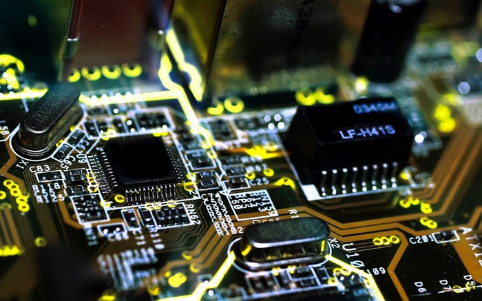 Close-up of a computer motherboard with microchips