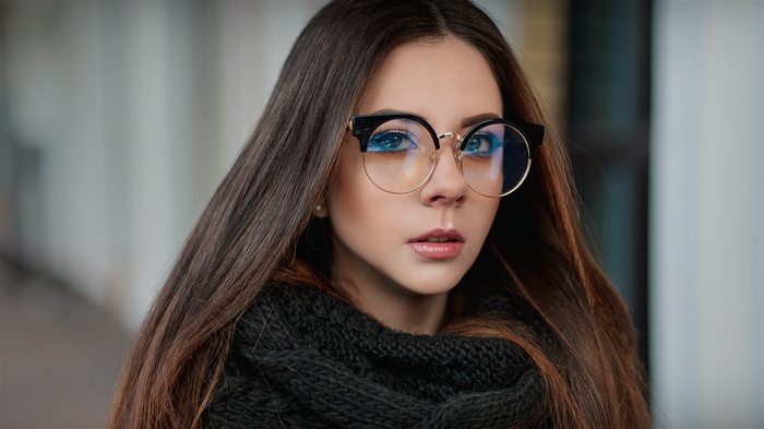 Woman with glasses and scarf