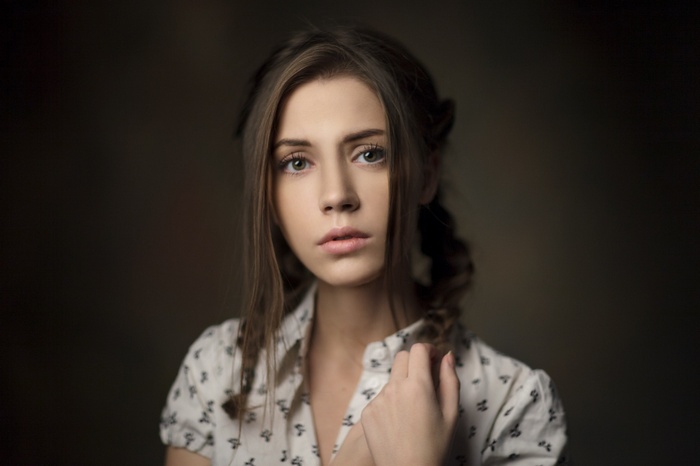 Portrait of Ksenia Kokoreva with braided hair