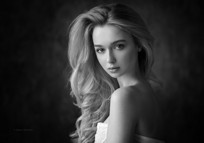 Monochrome portrait of a woman with blonde hair