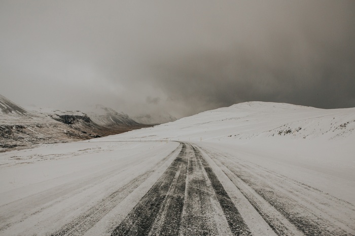 Snowy mountain road in winter