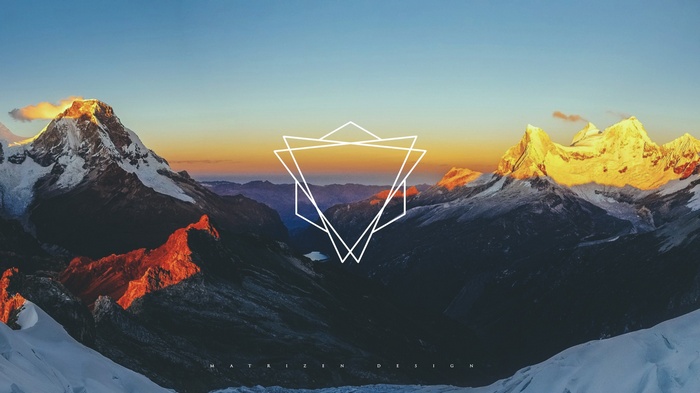 Geometric overlay on mountain landscape at sunset