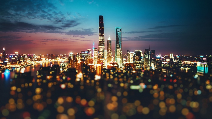 Shanghai skyline at night with bokeh lights