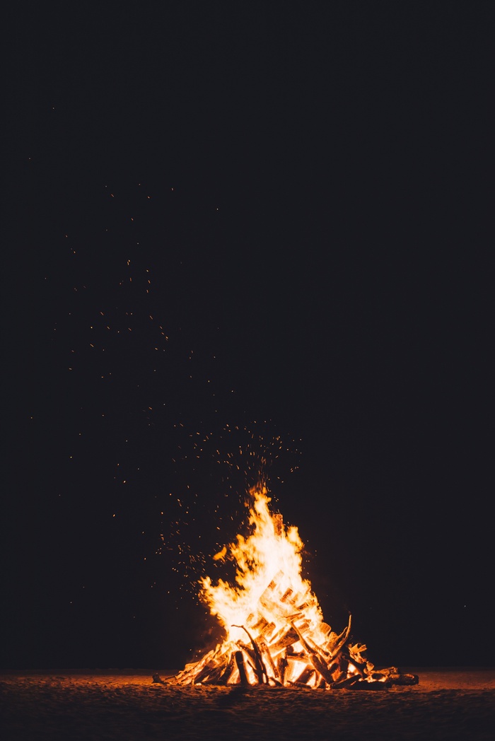 Bonfire burning brightly at night