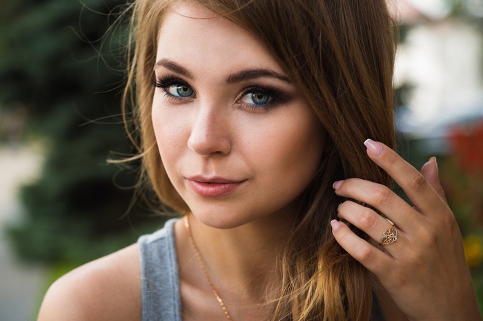 Portrait of a young woman with blue eyes