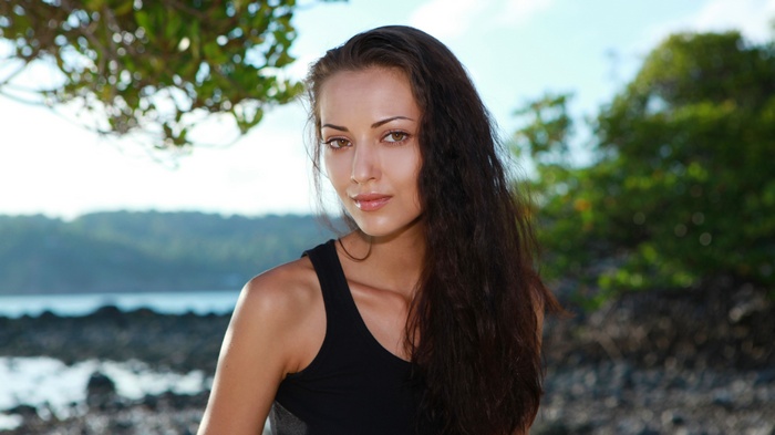 Anna Sbitnaya on a rocky beach