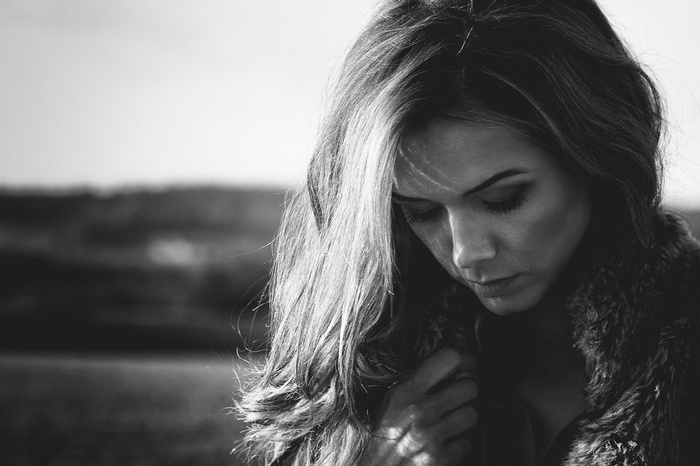 Monochrome portrait of a woman with long hair