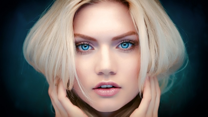 Portrait of blonde model Martina Dimitrova with blue eyes