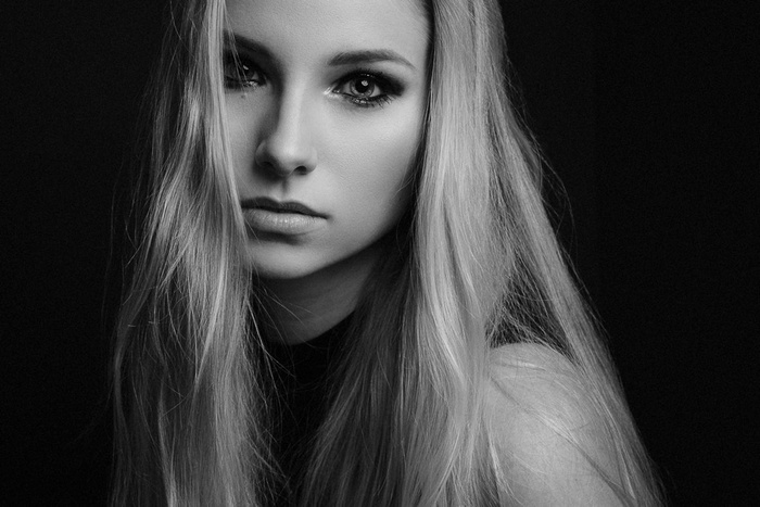 Monochrome portrait of a woman with blonde hair