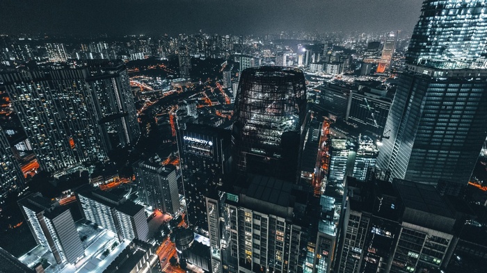 Night cityscape with illuminated skyscrapers