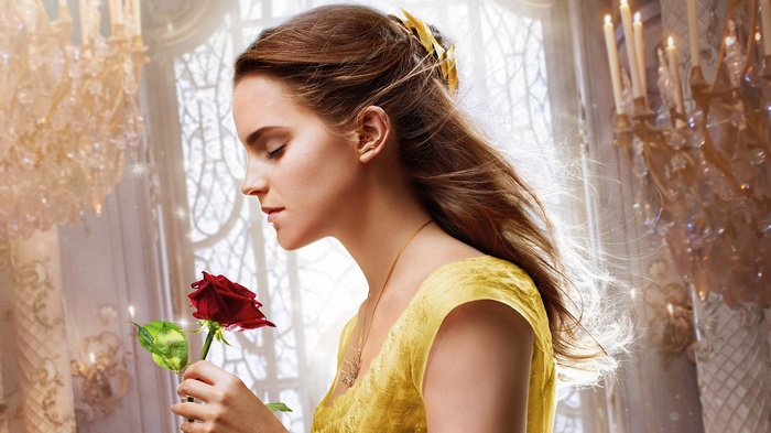 Emma Watson as Belle from Beauty and the Beast holding a rose