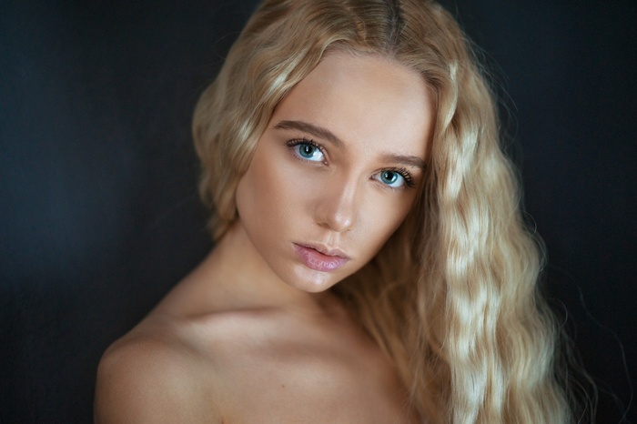 Portrait of a blonde woman with blue eyes
