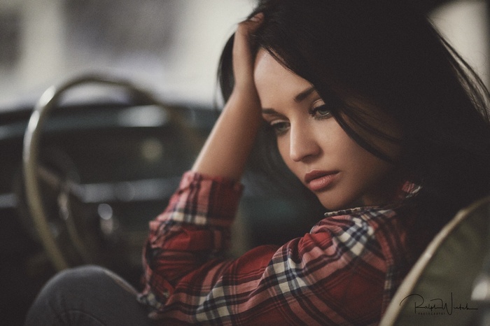 Angelina Petrova sitting in a car