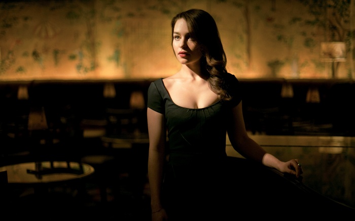 Emilia Clarke in a black dress