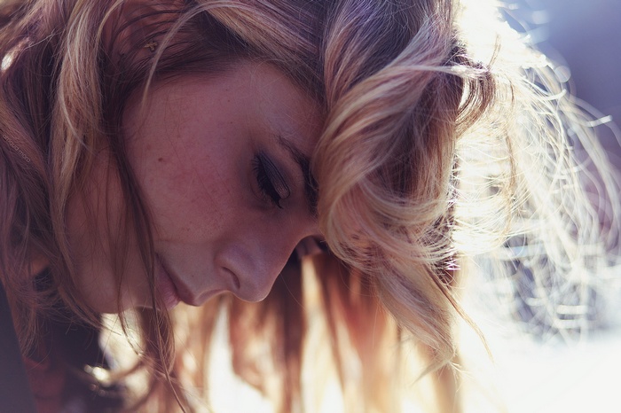 Close-up of a young woman with blonde hair