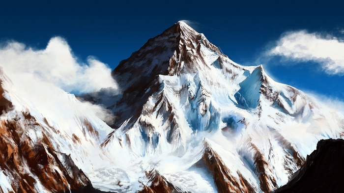 Snowy mountain peak with clouds