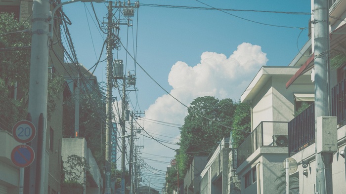 Street scene in Japan with power lines and buildings