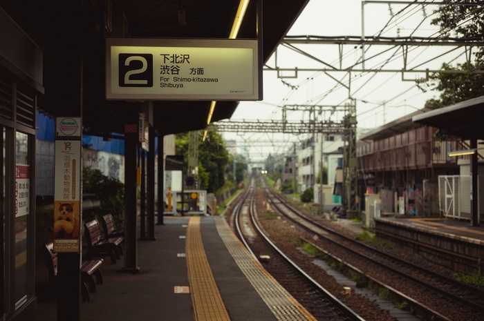 Train station platform sign for Shimo-kitazawa and Shibuya