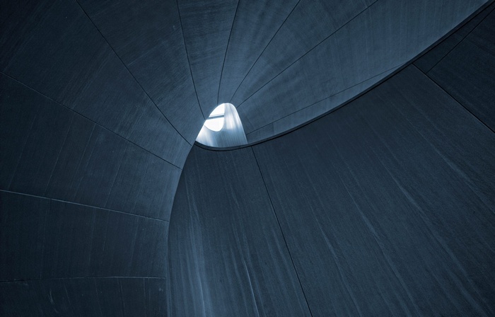 Abstract dark architecture with light source