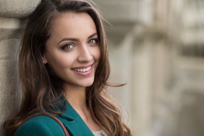 women, portrait, brunette, women outdoors, blue coat, looking at viewer, face, long hair, depth of field, smiling, pink lipstick