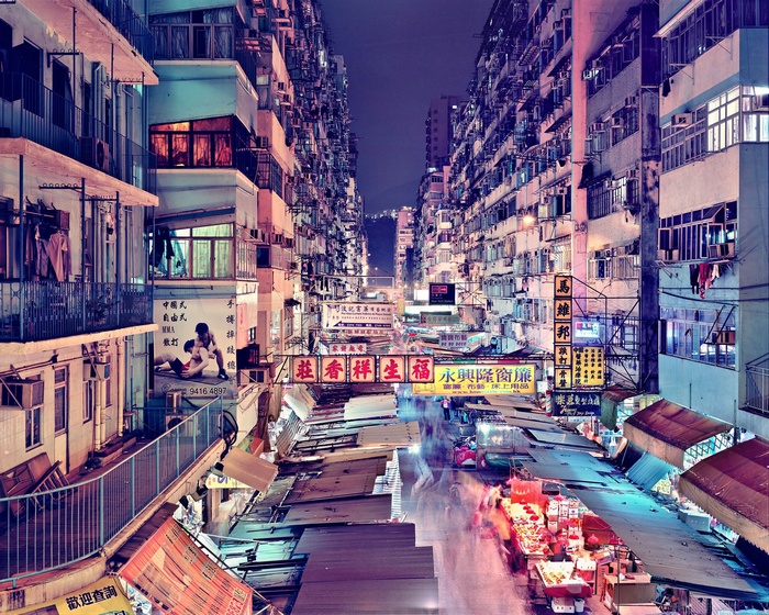 Night market in Hong Kong with tall buildings
