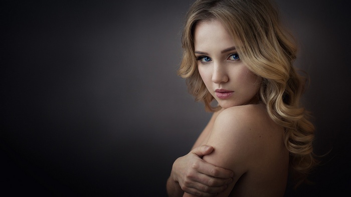 Woman with blonde hair and blue eyes