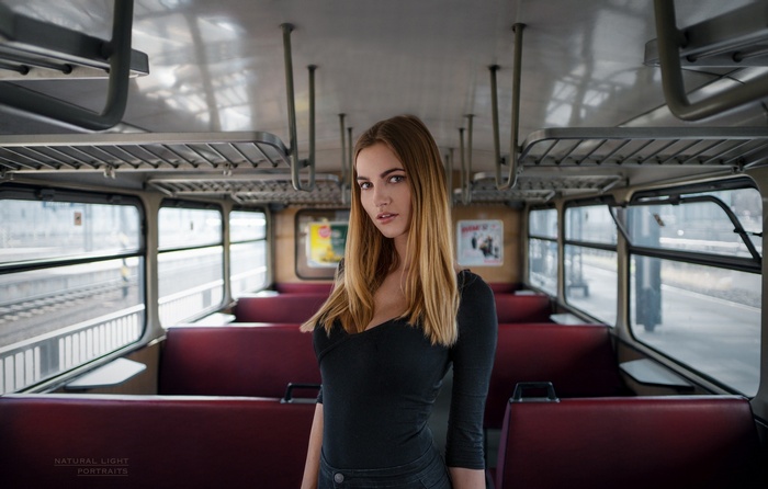 Woman in a train car