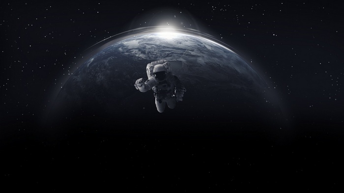 Astronaut floating in space with Earth in the background