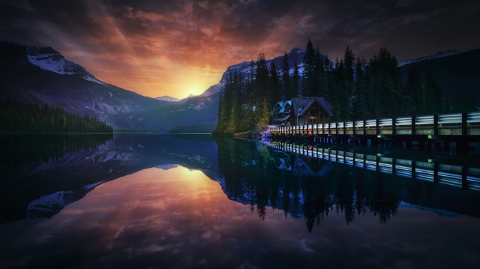 Sunset over Emerald Lake with lodge and mountains