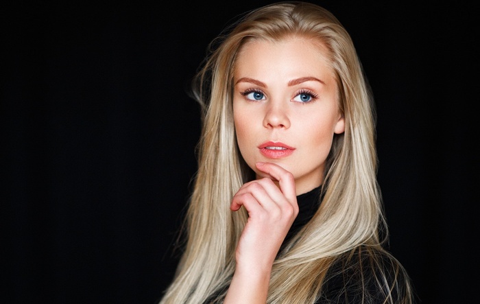 Portrait of blonde woman with blue eyes