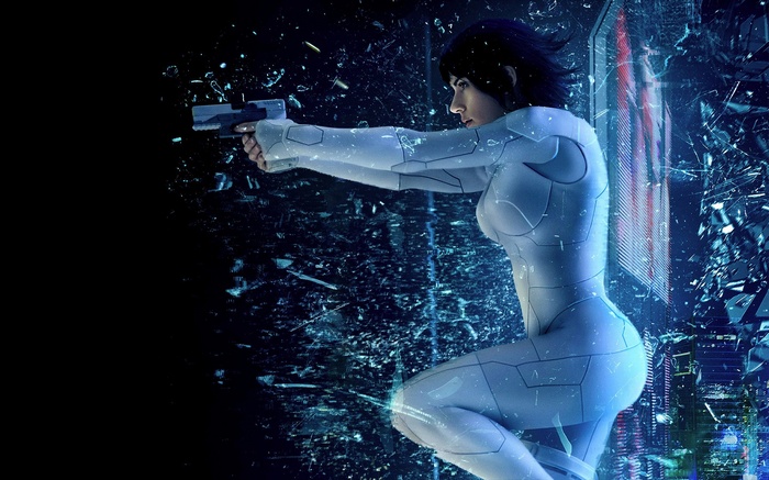 Motoko Kusanagi from Ghost in the Shell firing a gun